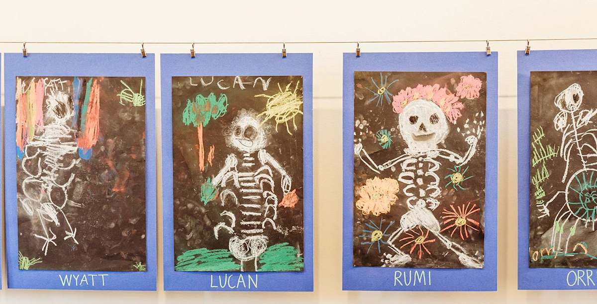 PS1 students taking part in a Dia de los Muertos celebration